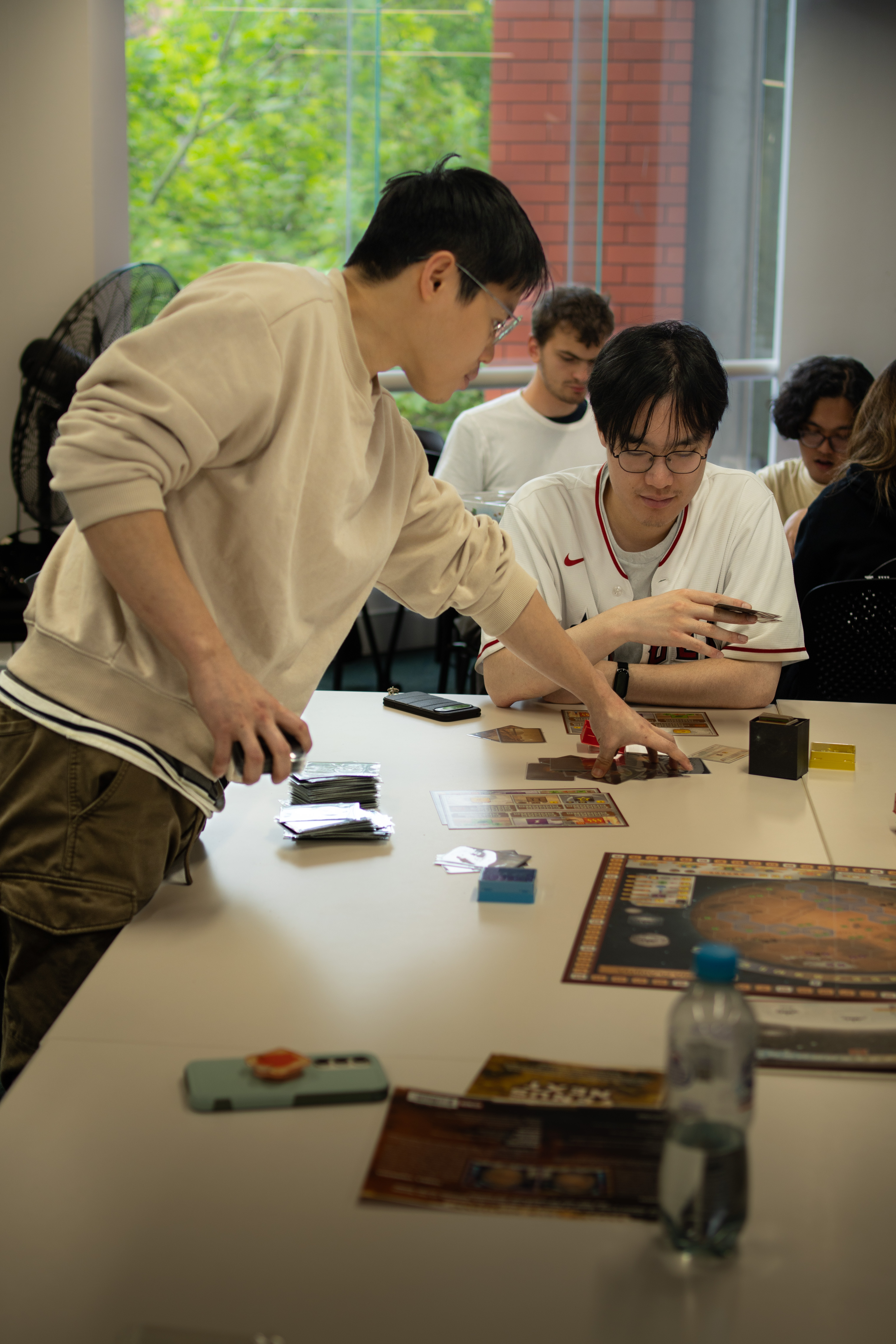 People playing board games